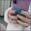 손끝에서 피어나는 네일아트 이미지