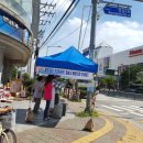 버스정류장 옆 횡단보도 이미지