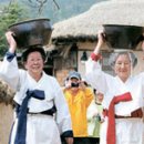 물동이 이고 가는 중앙일보