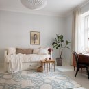 브라운과 블루 톤의 인테리어가 돋보이는 스웨덴의 멋진 아파트 이미지