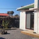 돌담 너머 하늘 이미지