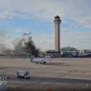 American Airlines flight catches fire at Denver airport 이미지