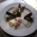 Filets de Sole Marguery(필레 드 솔 마르게리) : seafood stock으로 simmering한 가자미와 화이트와인을 넣은 생크림소스 이미지