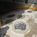 신사동주민센터 | 신사동 빌딩의 자동차통로 맨홀뚜껑 교체 공사 현장