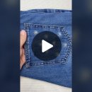청바지에 바늘 실로 수 놓기 이미지