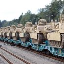 리투아니아 모츠카바 기차역에 정렬된 미군 에이브람스 탱크 이미지