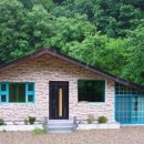 숲속의 하얀집 이미지