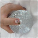 손끝에서 피어나는 네일아트 이미지