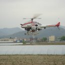 대산들판 "무인헬기로 농약 뿌려요" 이미지