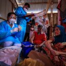October 1 - How Asia revved up vaccinations 이미지