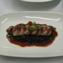 "Boudin blanc with beluga lentils" 이미지