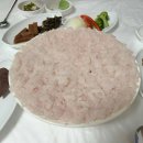 바닷가 위 하얀집민박 이미지