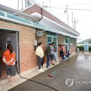 백인마을회관 연합뉴스