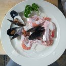 Filets de sole Marguery(필레 드 솔 마르게리) : seafood stock으로 simmering한 가자미와 화이트와인을 넣은 생크림소스 이미지