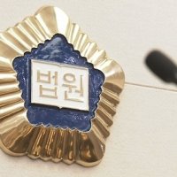수십억 뒷돈 받고 공사비 올려준 주택조합장 항소심서 가중…징역 6년